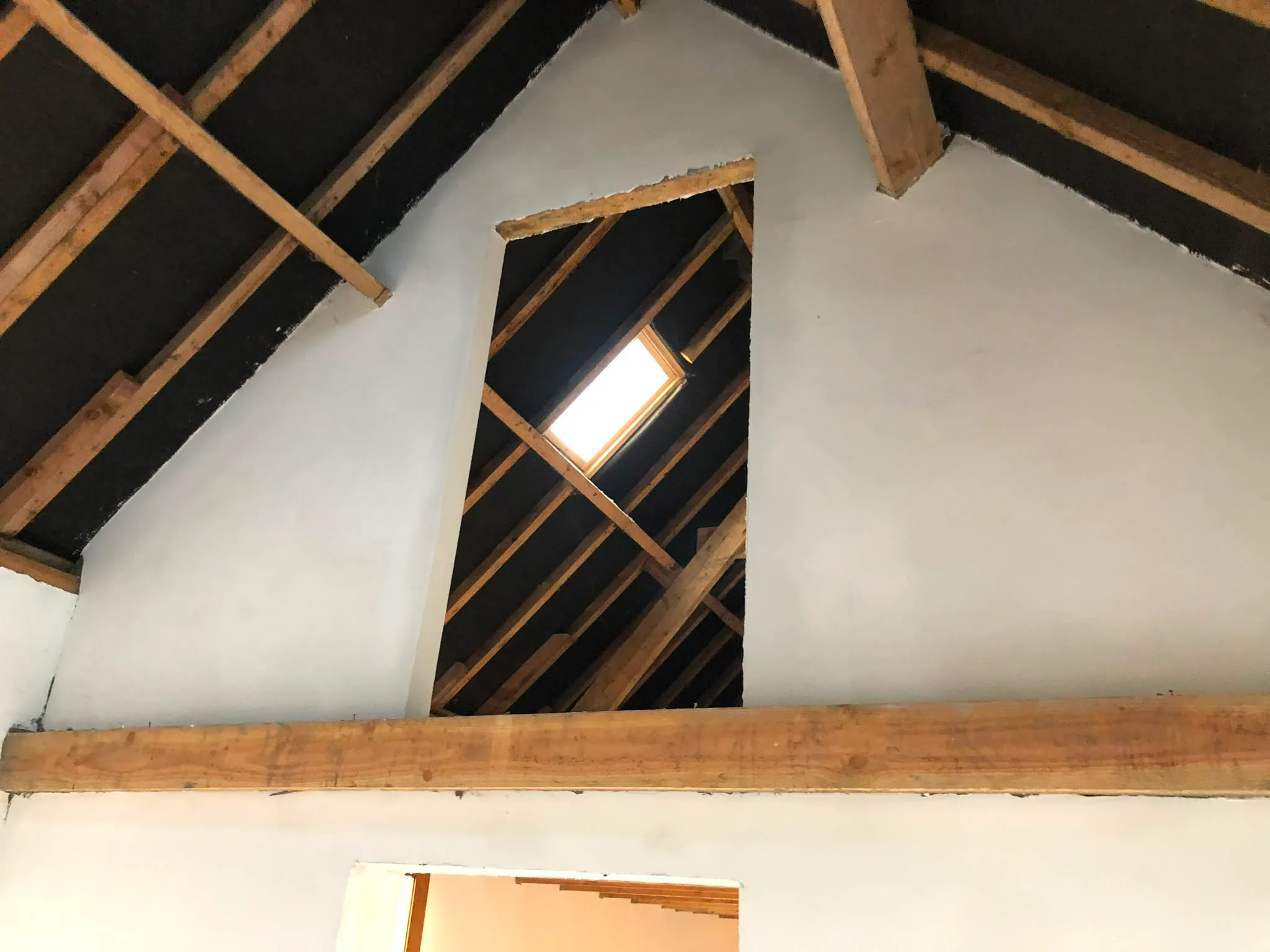 Dakconstructie met houten spanten en isolatie