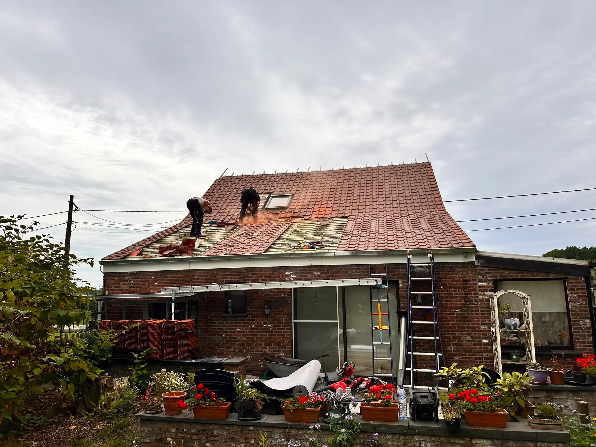 Dakwerken renovatie bakstenen woning